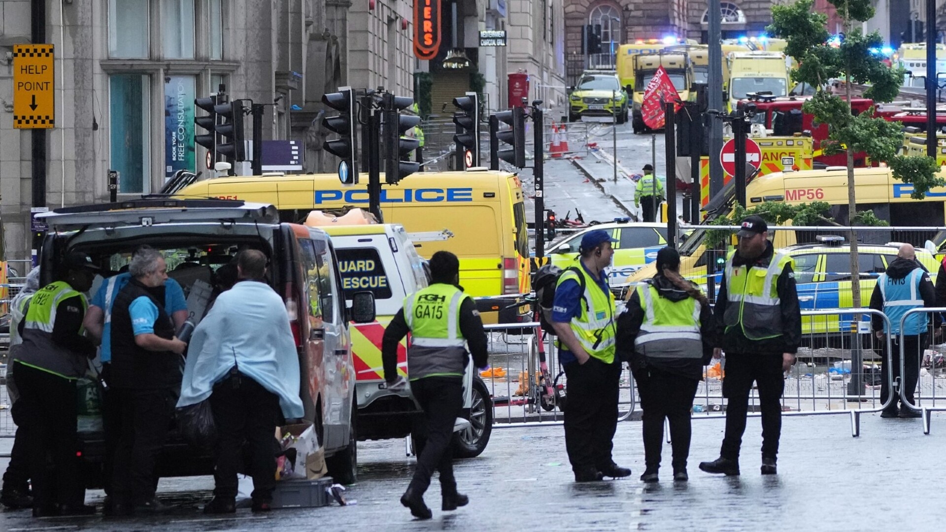 Car ploughs through crowd of pedestrians at Liverpool FC parade