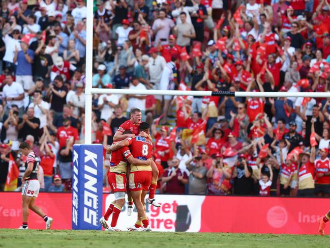 BRISBANE, AUSTRALIA - MARCH 05: Dolphins celebrate winning the round one NRL match between the Dolphins and Sydney Roosters at Suncorp Stadium on March 05, 2023 in Brisbane, Australia. (Photo by Chris Hyde/Getty Images)
