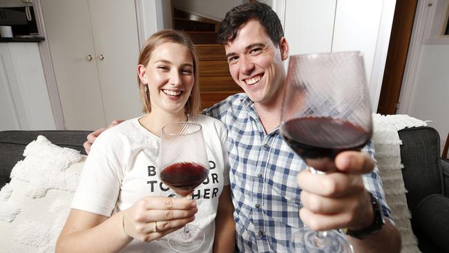 Brisbane couple Riley Will and Jeremy Snell drink more at home than going out to pubs and clubs. Picture: Josh Woning