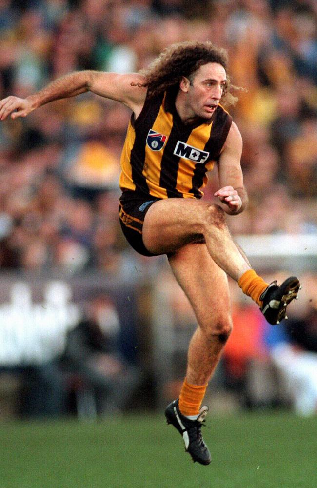 John Platten in full flight for his 250th game against Port Adelaide in 1997.