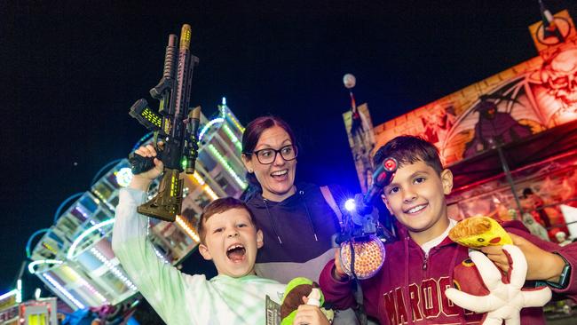 At sideshow alley are (from left) Keiran McErlean, Louise Mischke and Leon Murray at the 2022 Toowoomba Royal Show, Saturday, March 26, 2022. Picture: Kevin Farmer