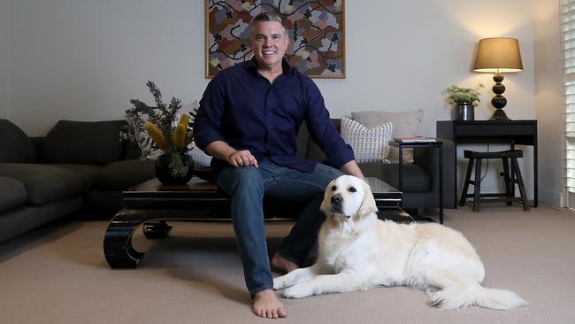 Voyages Indigenous Tourism Australia chief executive Matt Cameron-Smith at home with Chilli. Picture: Jane Dempster