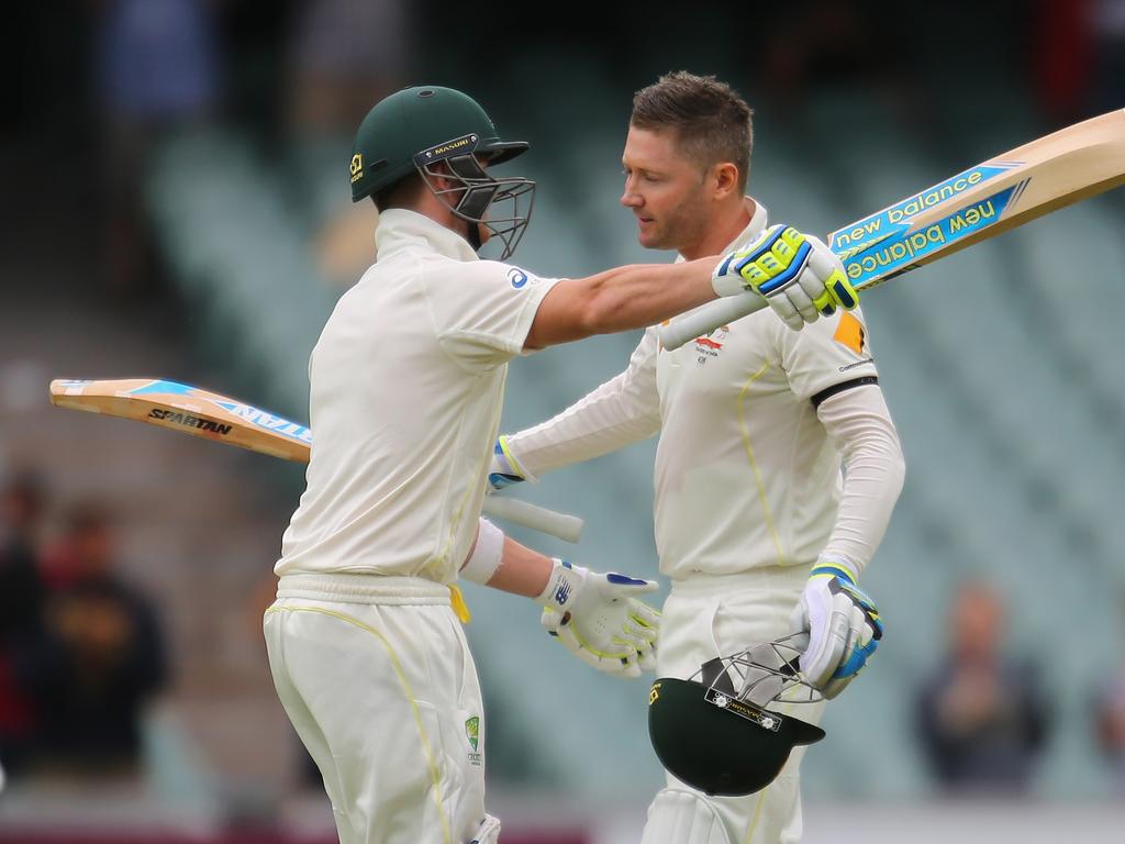 Michael Clarke (right) celebrates an emotional Test century in Adelaide. Picture: Scott Barbour/Getty Images.