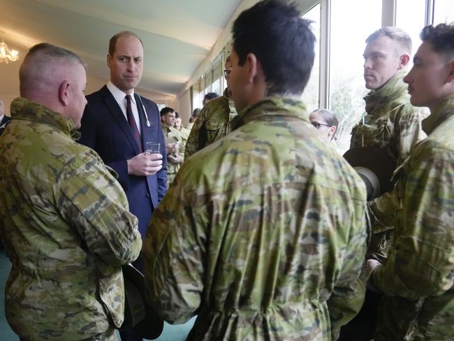 Prince William talks to troops from the 5th Royal Australian Regiment (5RAR) after a St David's Day parade in Windsor. Picture: Getty Images