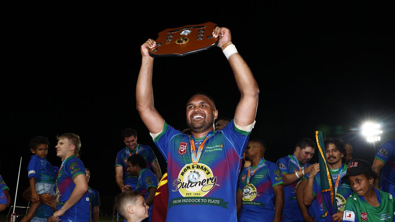 Innisfail Leprechauns' Bodean Tanner holds the trophy aloft after winning Player of the Final after winning the FNQRL Reserve Grade grand final, beating the Cairns Kangaroos 12 points to 10. Picture: Brendan Radke