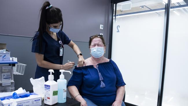 A woman receives her third dose of Covid-19 vaccine in Ramat Gan, Israel. Picture: Getty Images.