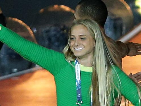 GLASGOW COMMONWEALTH GAMES 2014-DAY 11. An Australian Athlete on stage at the Kylie Minogue song section at the Closing Ceremony from Hampden Park, Glasgow. Pics Adam Head