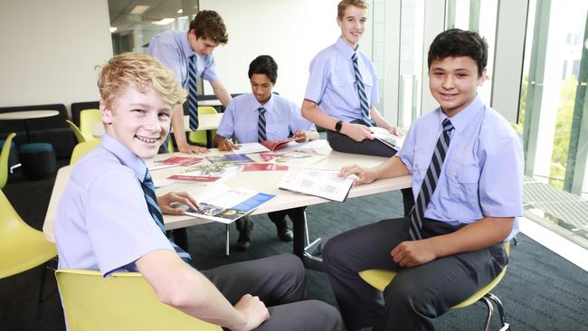 Brisbane Grammar School is among the top-performers - students Hamish Moss, 15, Ned Boorer, 14, Alex Thakur, 14, Matthew Love, 14, and Carter Aitken, 15. (AAP Image/Claudia Baxter)