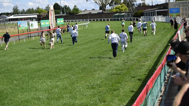 Bet365 Traralgon Cup Day, held at Traralgon Racecourse, Traralgon, Victoria, 1st December 2024. The Cup race meeting was cancelled due to a heavy track. Despite this, many patrons attended. Patrons run their own race on the track. Picture: Andrew Batsch