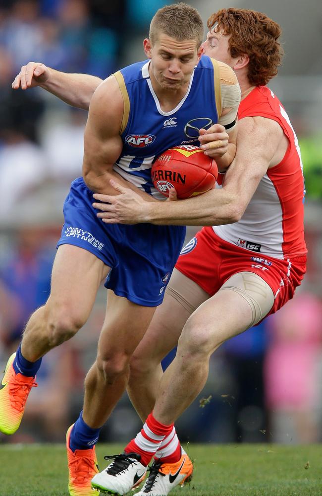Jed Anderson is tackled by Sydney forward Gary Rohan. Picture: Getty Images