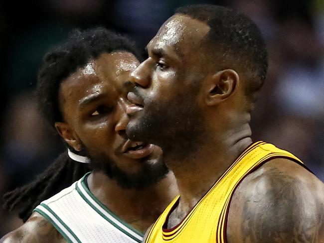 Boston Celtics' Jae Crowder, left, has words with Cleveland Cavaliers' LeBron James.