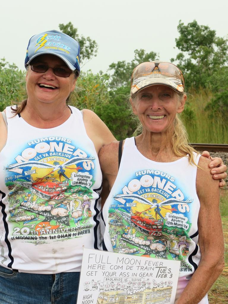 Evie from Humpty Doo with Mooch from Livingstone, waiting for The Ghan. Picture: Elise Graham
