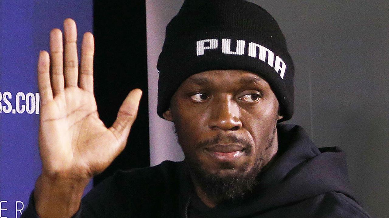 Usain Bolt  isn’t giving up on his football dream.