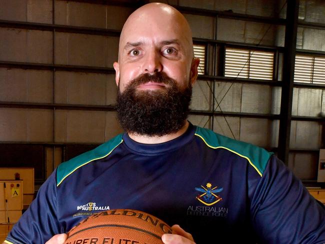 Townsville Veteran and Team Australia member Torben Louwen-Skovdam, with strength and conditioning coach Brian Heilbronn (left) at the Townsville Basketball Stadium, is set for the upcoming Invictus Games. Picture: Evan Morgan