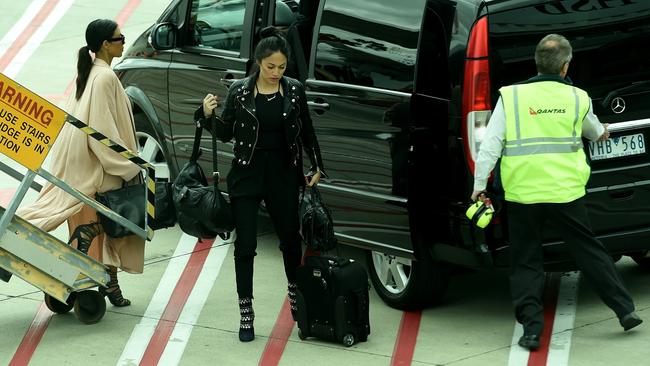 Kim Kardashian arrives in Australia as she steps off the plane into a waiting car. Picture: Nicole Garmston