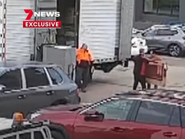 Channel 7 screengrabs of CCTV footage showing the three NSW removalists at the Ariele Apartments, the cause of the current Covid-19 outbreak in Victoria.