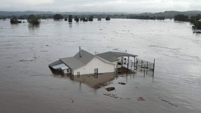 Josh and Sarah’s Mondrook rental floating down the Manning River at Mondrook. Pic Facebook