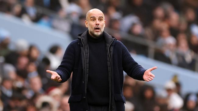 MANCHESTER, ENGLAND - DECEMBER 26: Pep Guardiola, Manager of Manchester City, reacts during the Premier League match between Manchester City FC and Everton FC at Etihad Stadium on December 26, 2024 in Manchester, England. (Photo by Carl Recine/Getty Images)