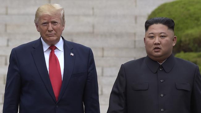 Donald Trump and Kim Jong-un when they met on the North Korean side of the Demilitarised Zone in June. Picture: AP