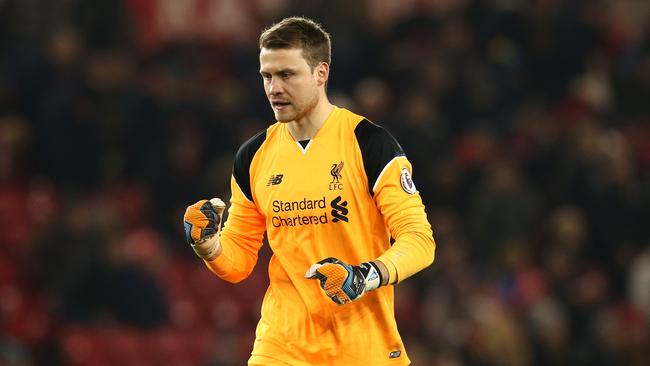 Simon Mignolet of Liverpool celebrates the final whistle.