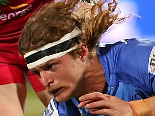 PERTH, AUSTRALIA - JULY 05: Nick Cummins of the Force goes to ground after being tackled during the round 18 Super Rugby match between the Western Force and the Queensland Reds at nib Stadium on July 5, 2014 in Perth, Australia. (Photo by Paul Kane/Getty Images)