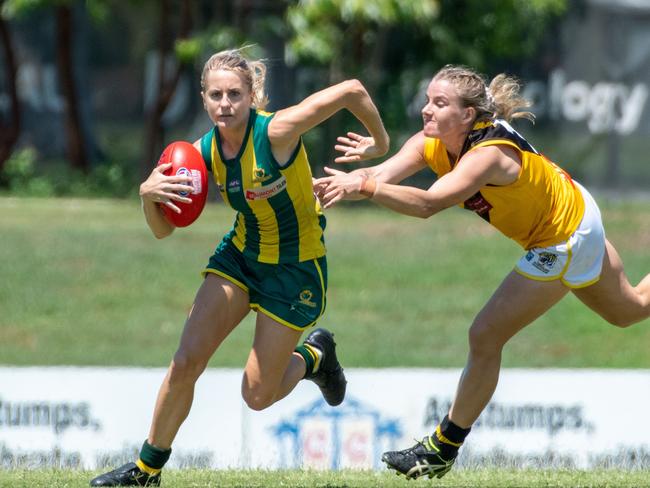 PINT's Katie Streader running hard with the ball. Picture: Aaron Black AFLNT/Media