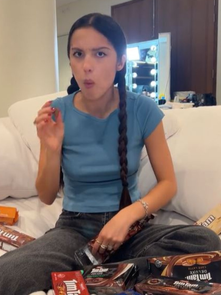 She now understands the Tim Tam hype. Picture: TikTok/Olivia Rodrigo