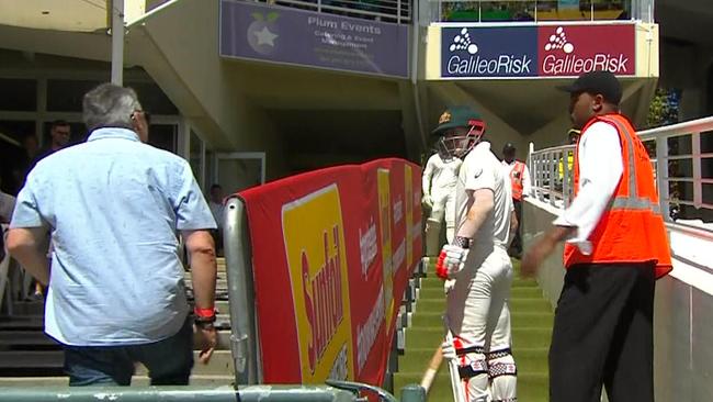 A Cape Town patron has a crack at David Warner on his way up the players' chase.