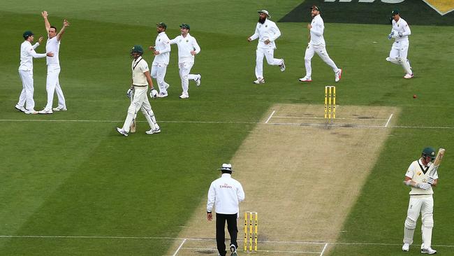 Australian captain Steve Smith can’t bear to watch as the South Africans rip through the Australians in the second innings of the second Test in Hobart. Picture: Getty Images