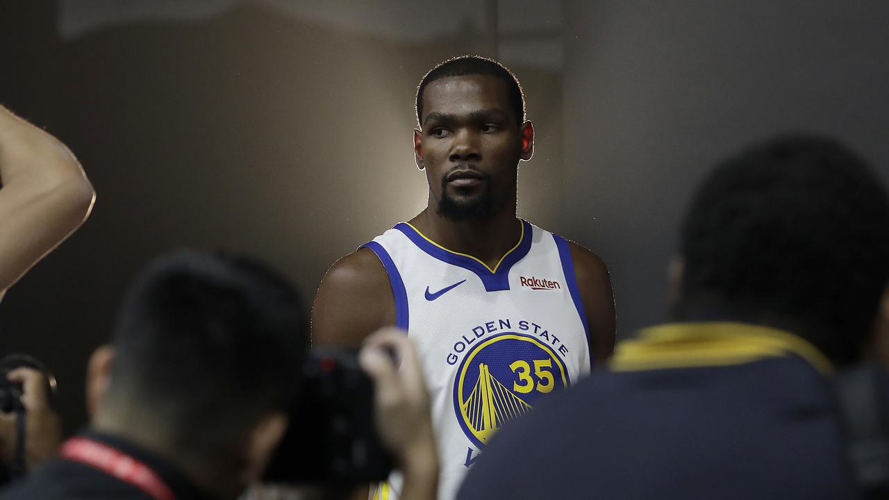 Golden State Warriors' Kevin Durant poses for photos.