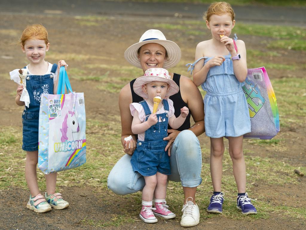 Enjoying ice cream are (from left) Scarlett, Harriet and Macee Lloyd with mum Anglea Thiess at the 2022 Toowoomba Royal Show, Friday, March 25, 2022. Picture: Kevin Farmer