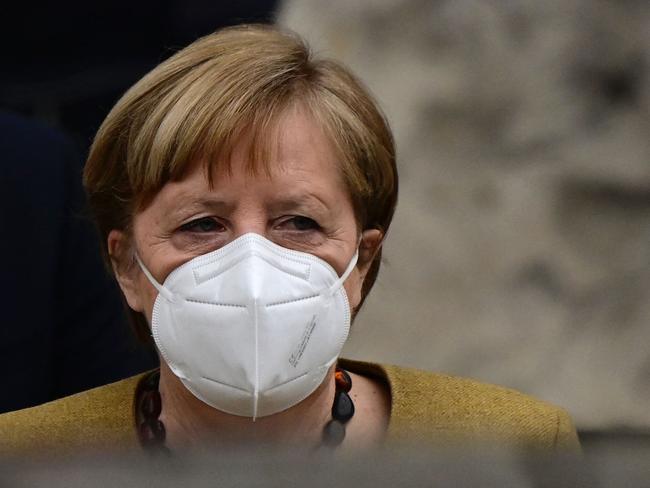 German Chancellor Angela Merkel leaves the Reichstag building, seat of the German lower house of parliament Bundestag. Picture: AFP