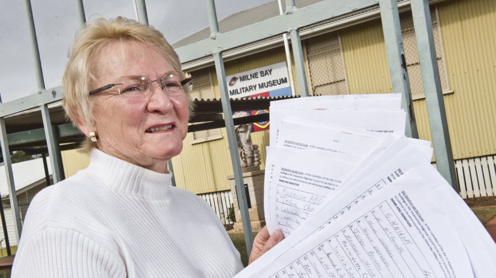 SUPPORTERS SIGN: Milne Bay Military Museum president Marian Jones with many signatures to save the museum. Thursday, 5th Jul, 2018. Picture: Nev Madsen