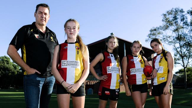 Mim Potter, President Craig Scott, Ruby Grant, Eve Mackenzie and Grace Bridge from Goodwood Football Club. AAP Image/Morgan Sette