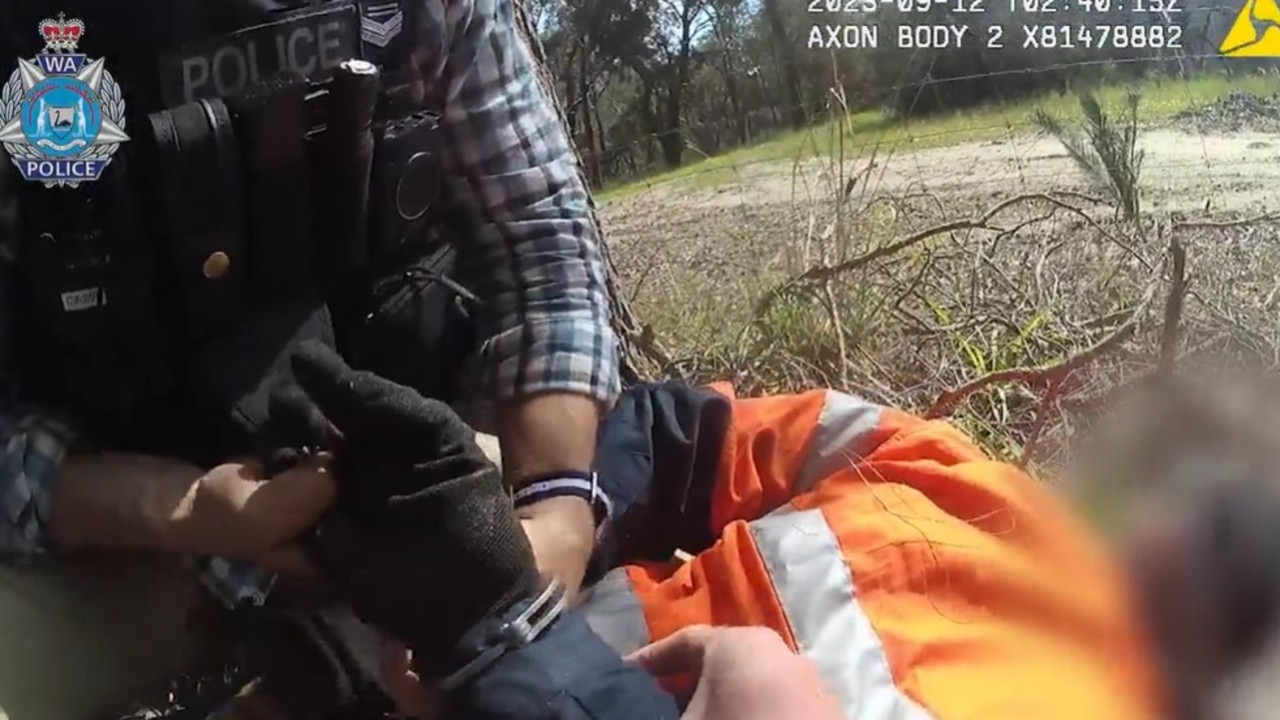 Police body-cam vision shows David Crawford allegedly running from officers in Stake Hill bushland. Picture: Supplied / WA Police