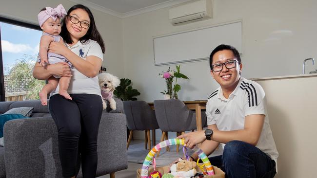 Christina and Adrio Ricafort, with their six-month-old daughter Adriana and dog Sushi, will soon move into a new house. Picture: Nicki Connolly.