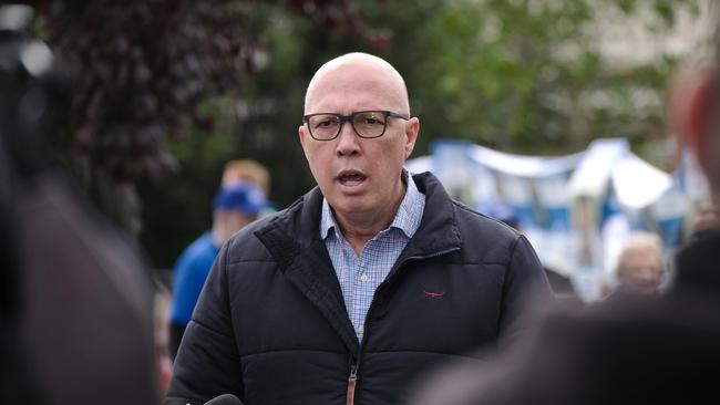 The Leader of the Opposition Peter Dutton and the Liberal Party candidate for Aston, Roshena Campbell at Lysterfield Primary School on by-election day. Picture: NCA NewsWire / Luis Ascui