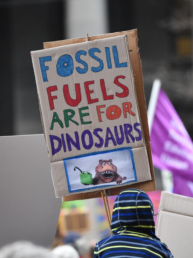 Climate change protesters in the CBD today. Picture: AAP / David Mariuz