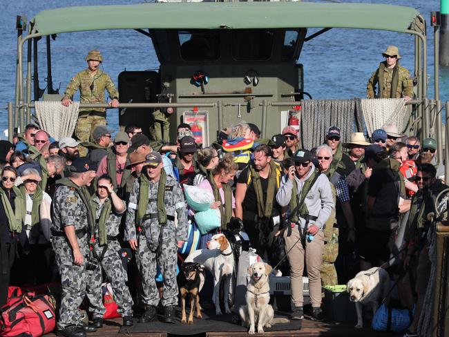 08/01/2020  Evacuees from Mallacoota disembark at HMAS Creburus after travelling on  HMAS Choules from Mallacoota, the town that has become the face of Victoria's recent spate of devastating bushfires.David Geraghty / The Australian.