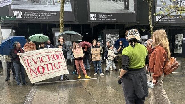 A group of protesters have gathered outside the RBA ahead of today's rate announcement.