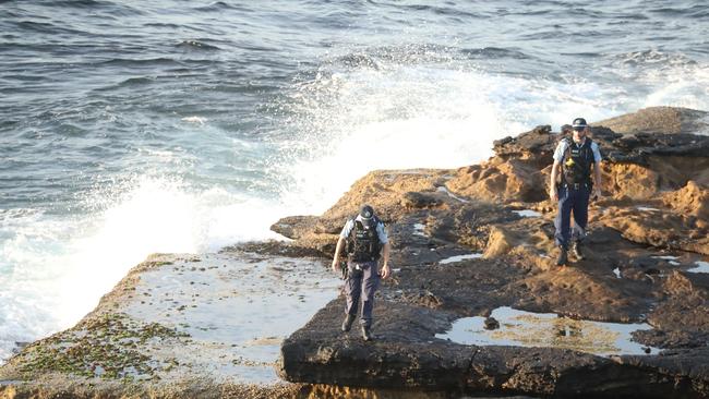 NSW Police search for human remains following a shark attack at Little Bay. Picture: John Grainger