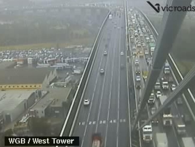 West Gate Fwy delays after tree falls over three lanes of the road. Picture: VicRoads