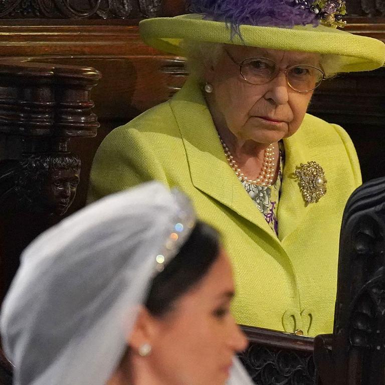 The Queen Elizabeth looks on at Meghan Markle on her wedding day. Picture: Jonathan Brady/AFP.