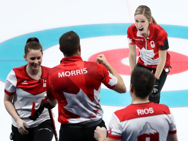 John Morris and Kaitlyn Lawes of Canada celebrate defeating Jenny Perret and Martin Rios Switzerland to win the gold medal during the Curling Mixed Doubles Gold Medal Game on day four of the PyeongChang 2018 Winter Olympic Games at Gangneung Curling Centre on February 13, 2018 in Gangneung, South Korea. Picture: Getty Images