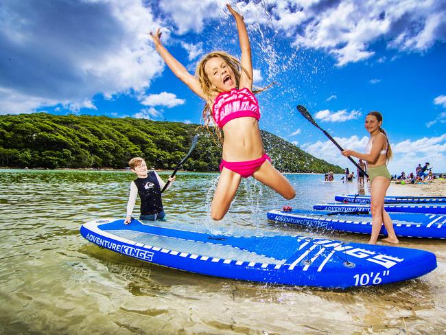 Easter Tourism - Gold Coast.Enjoying their first day of the holidays since lockdown was LoganÃs Forward family who enjoyed a day at Tallebudgera Creek on the Gold Coast. Zahli Forward (pink), 7, brother Theo, 9, sister Grace, 12.Picture: NIGEL HALLETT