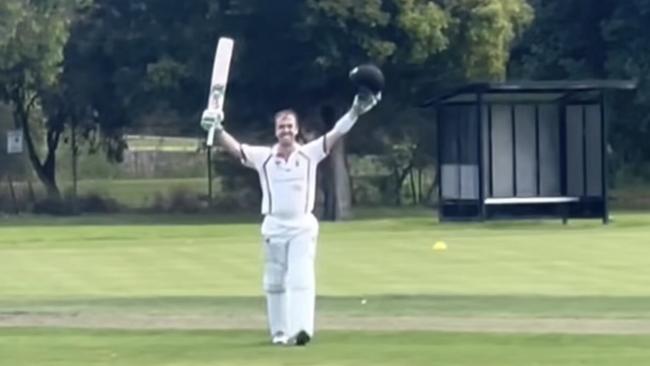 Tom Morris raises his bat after reaching 200 for South Caulfield on Saturday.