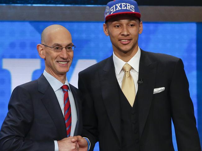 LSU's Ben Simmons poses for a photo with NBA Commissioner Adam Silver after being selected as the top pick by the Philadelphia 76ers during the NBA basketball draft, Thursday, June 23, 2016, in New York. (AP Photo/Frank Franklin II)
