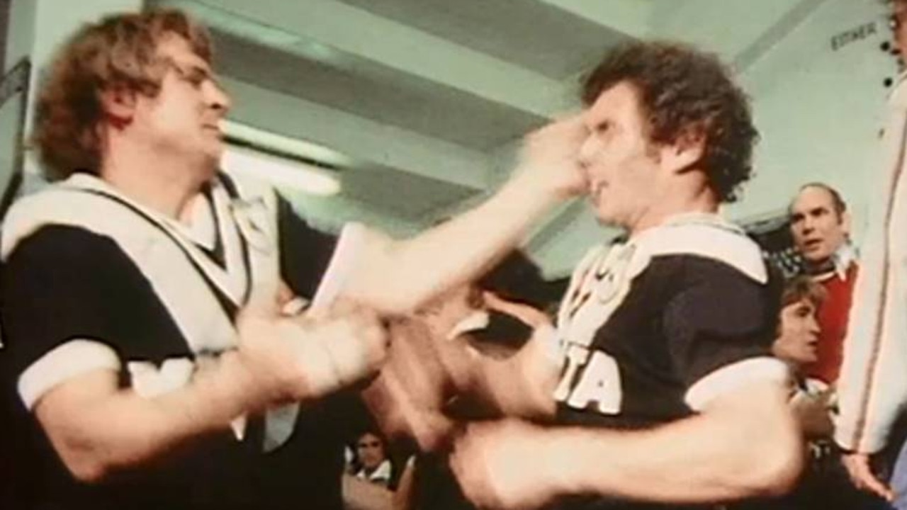 Tommy Raudonikis leads the Magpies' face-slapping warm-up