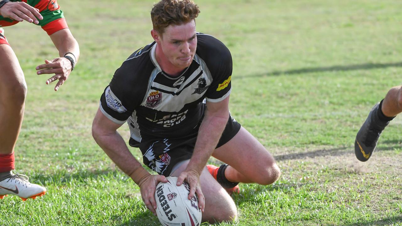 Matt Craven gets over the line for another try for the Magpies.