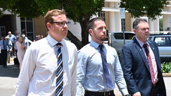 Lawyer Luke Officer, Constable Zachary Rolfe and former NTPA president Paul McCue outside the Darwin Supreme Court in February 2022.